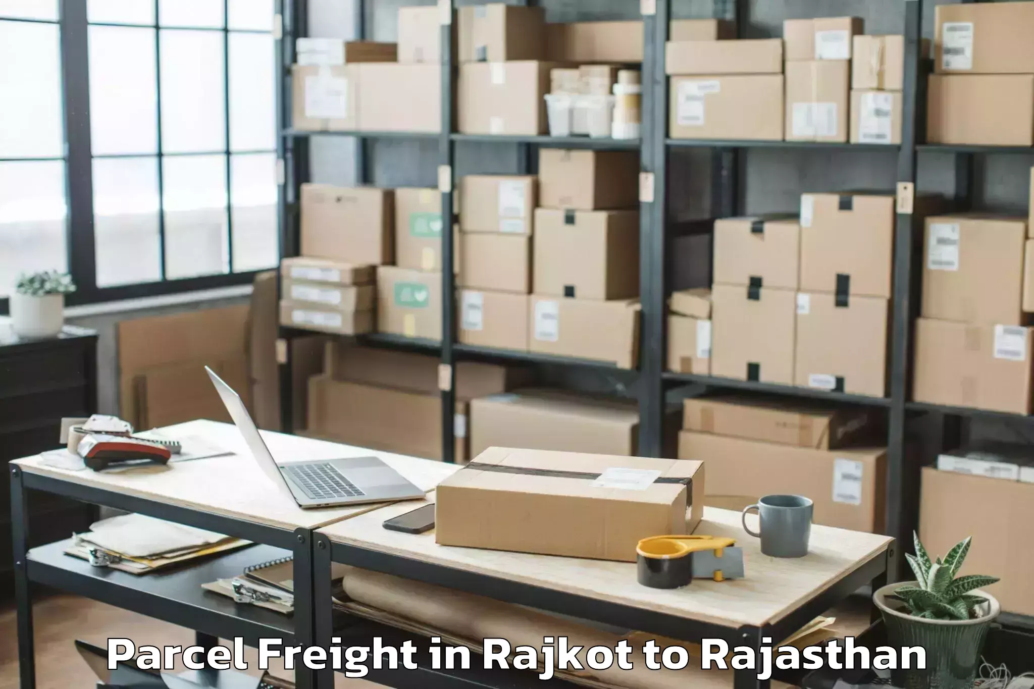 Book Rajkot to Khetri Nagar Parcel Freight Online